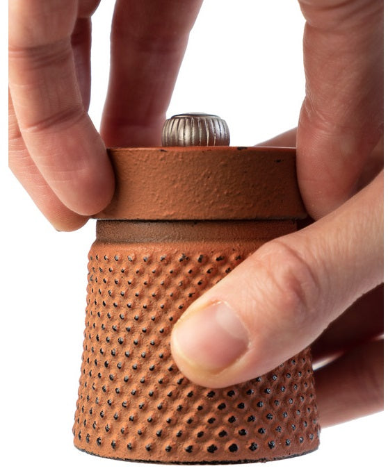 Peugeot Bali Fonte Orange Cast Iron Pepper Mill by Kitchen Niche