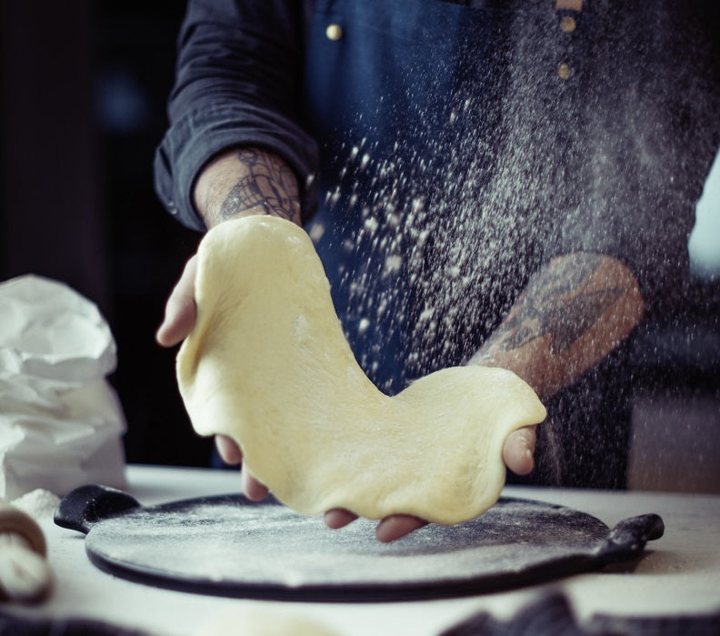 Emile Henry Smooth Pizza Stone Charcoal Black by Kitchen Niche