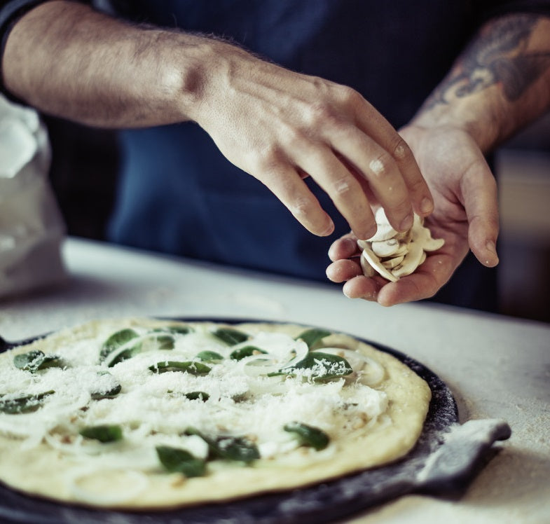 Emile Henry Smooth Pizza Stone Charcoal Black by Kitchen Niche