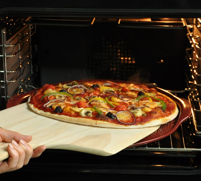 Emile Henry Ridged Pizza Stone Burgundy Red by Kitchen Niche